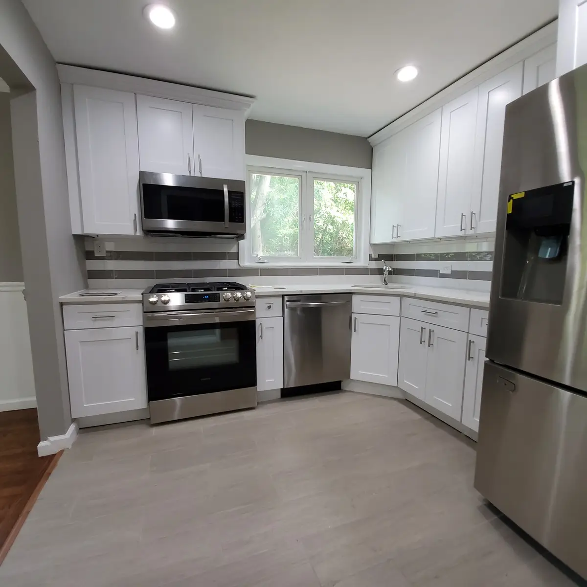Modern kitchen with white cabinets