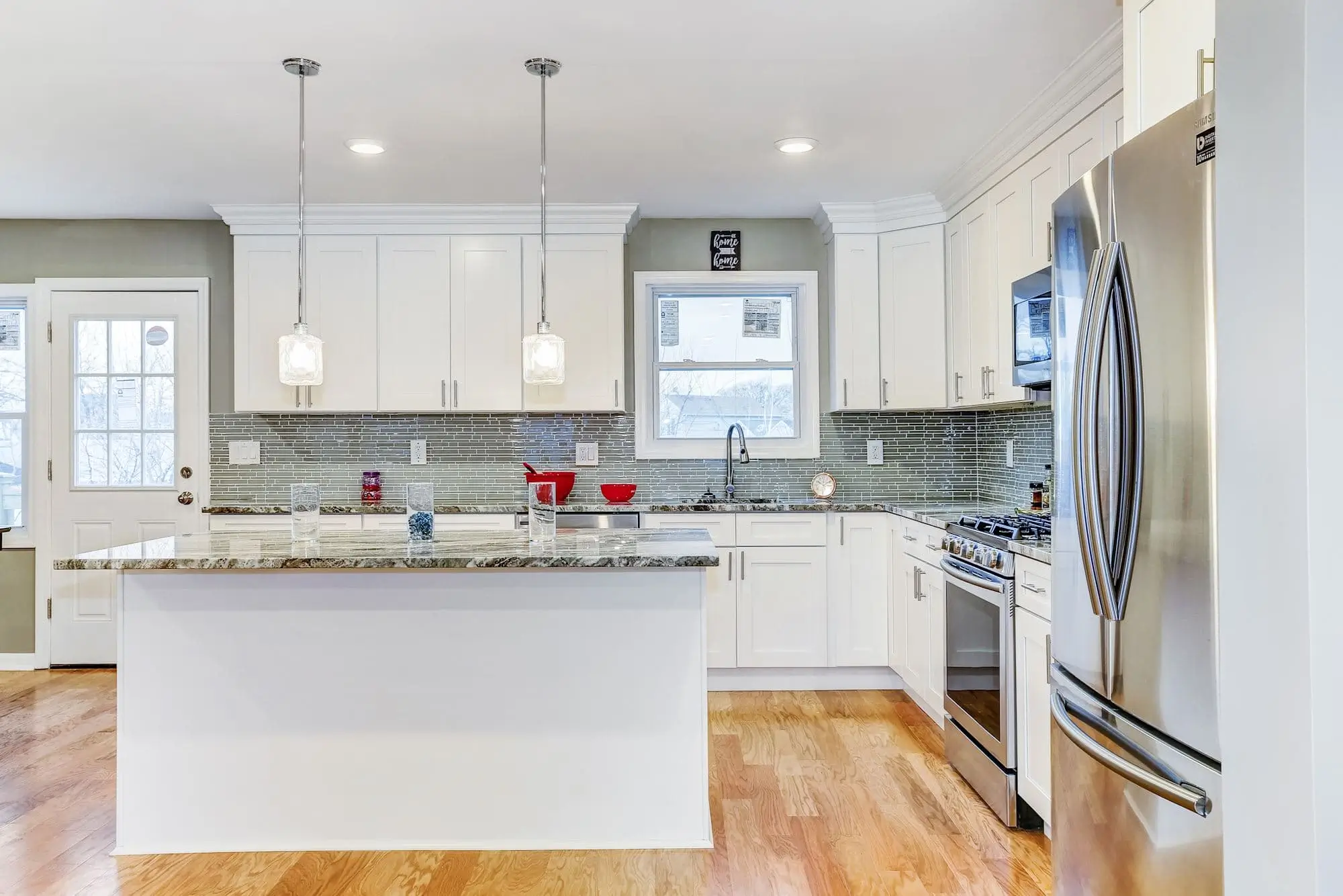 Elegant kitchen with white central island