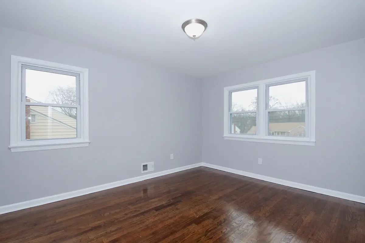 Room with dark wood floor