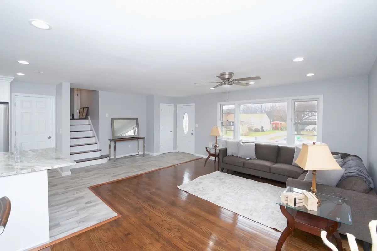 Bright living room with gray sofas