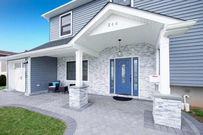 Two-story house with blue and white facade