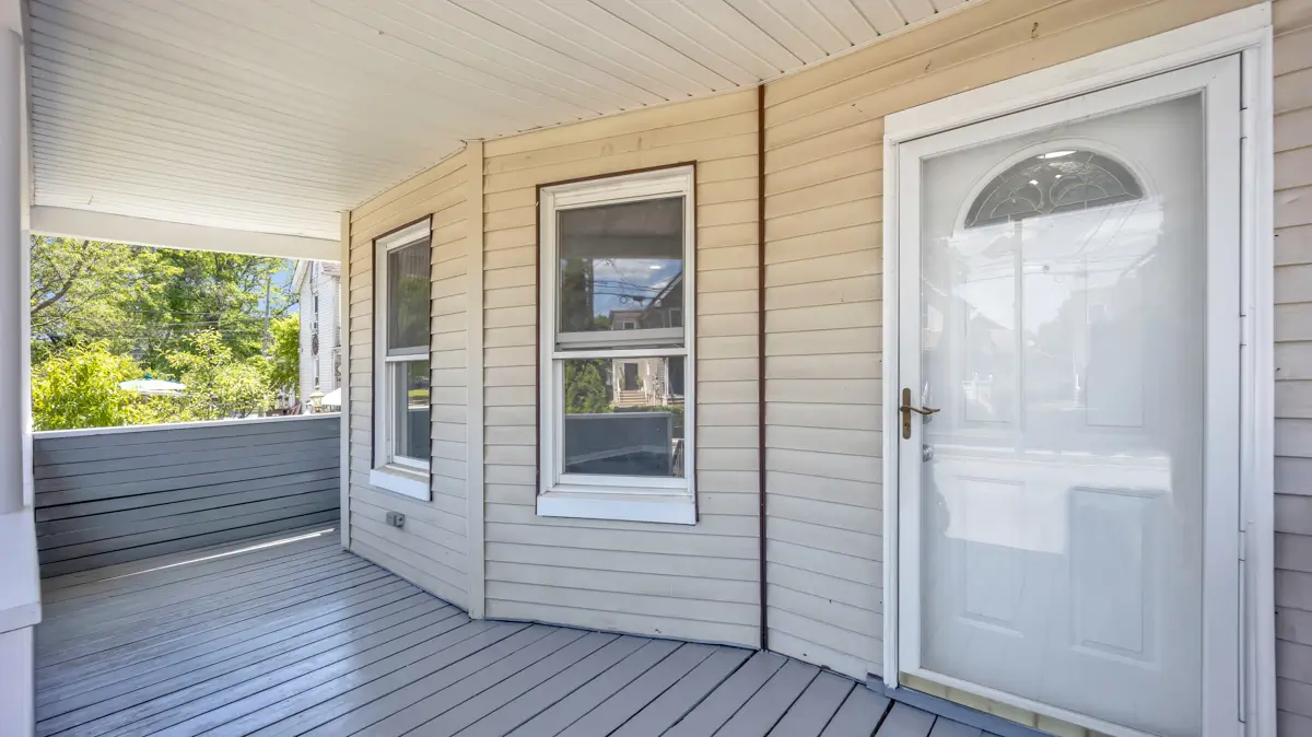 Front porch with white door